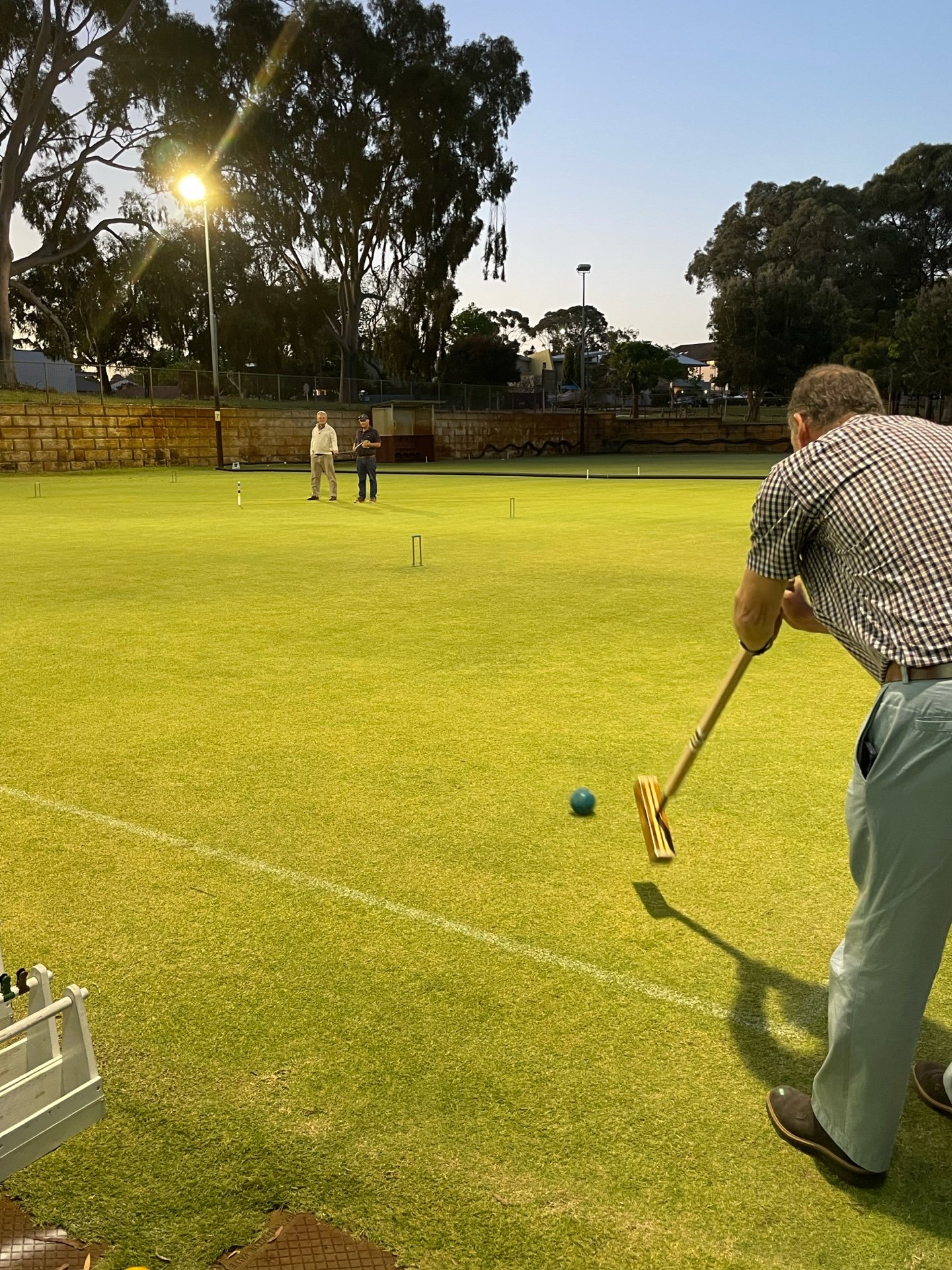 One of the club's floodlit grass courts